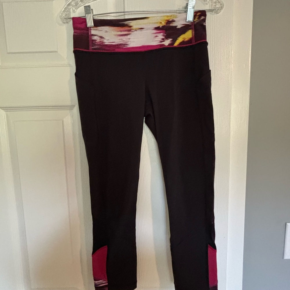 Lululemon Athletica Black Leggings with Pink and Yellow Accents